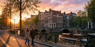 Exploring Amsterdam Canal Belt with an Escort